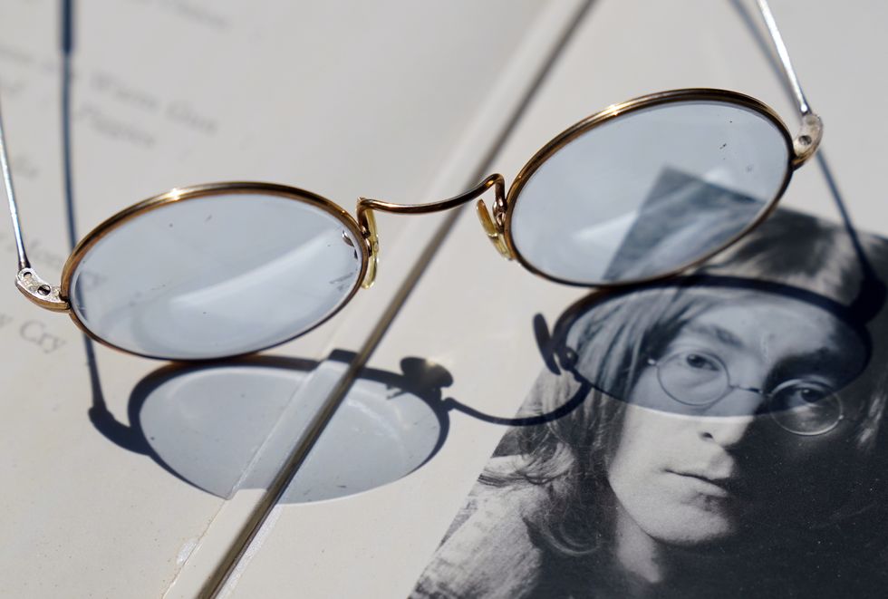 Blue-tinted glasses given by John Lennon to be auctioned with Abbey Road photos