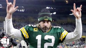 Aaron Rodgers Embodies Spirit of Nic Cage Arriving at Packers