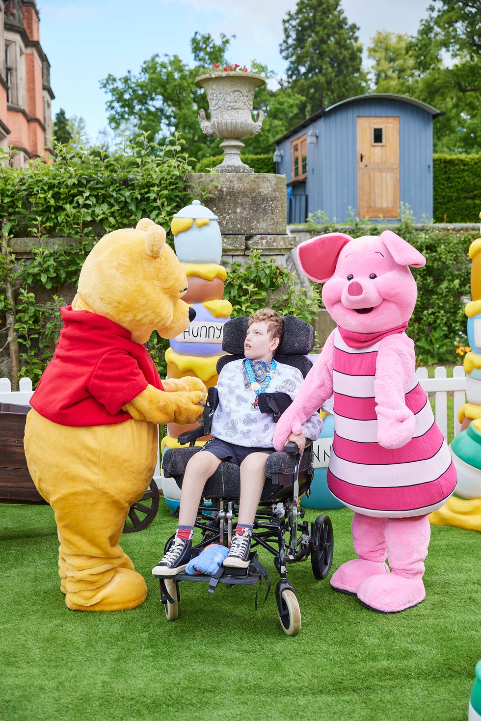 Make-A-Wish teenager meets and hugs favourite Disney characters
