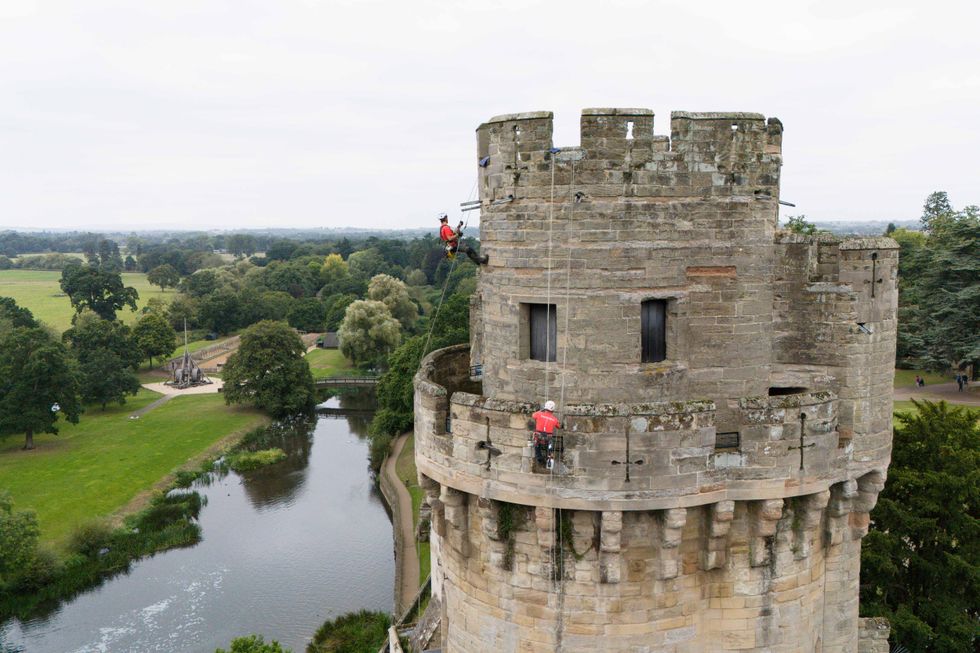 In Pictures: Abseiling experts give Warwick Castle a clean-up