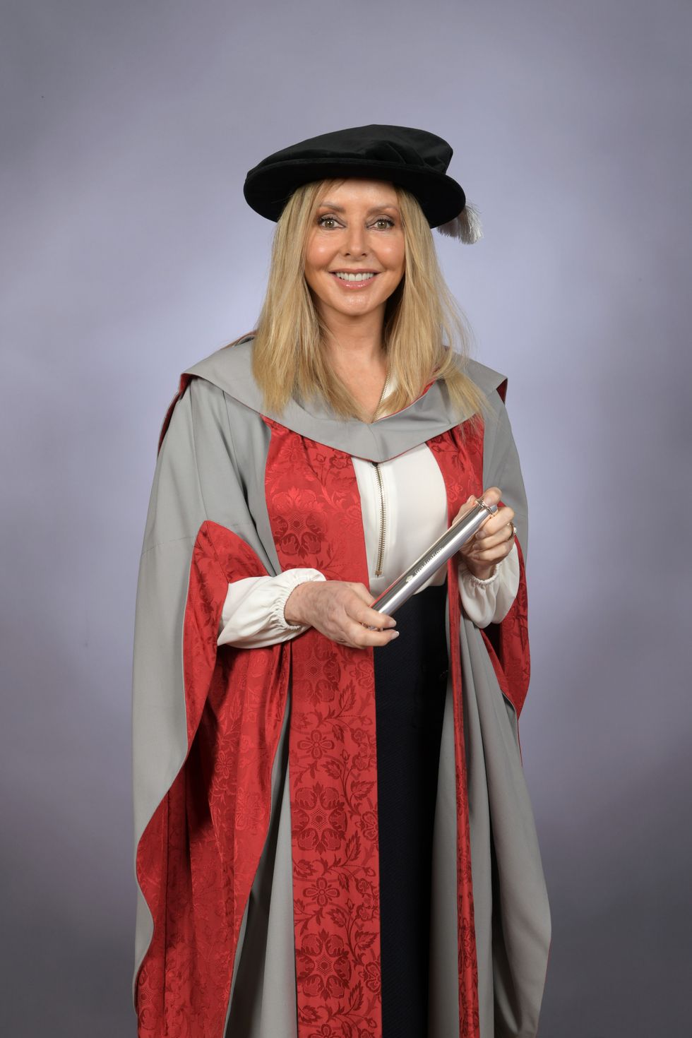 Carol Vorderman achieves family double with university honour