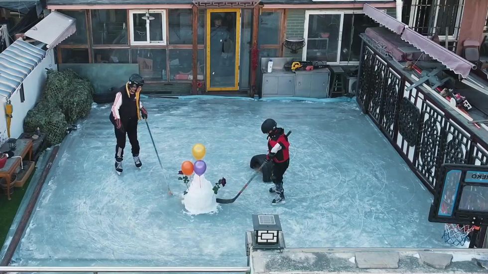 And here's an alligator ice skating in a baseball stadium