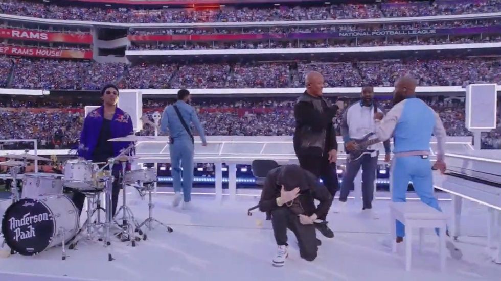 Super Bowl LVI: Eminem takes a knee, 50 Cent hangs upside down