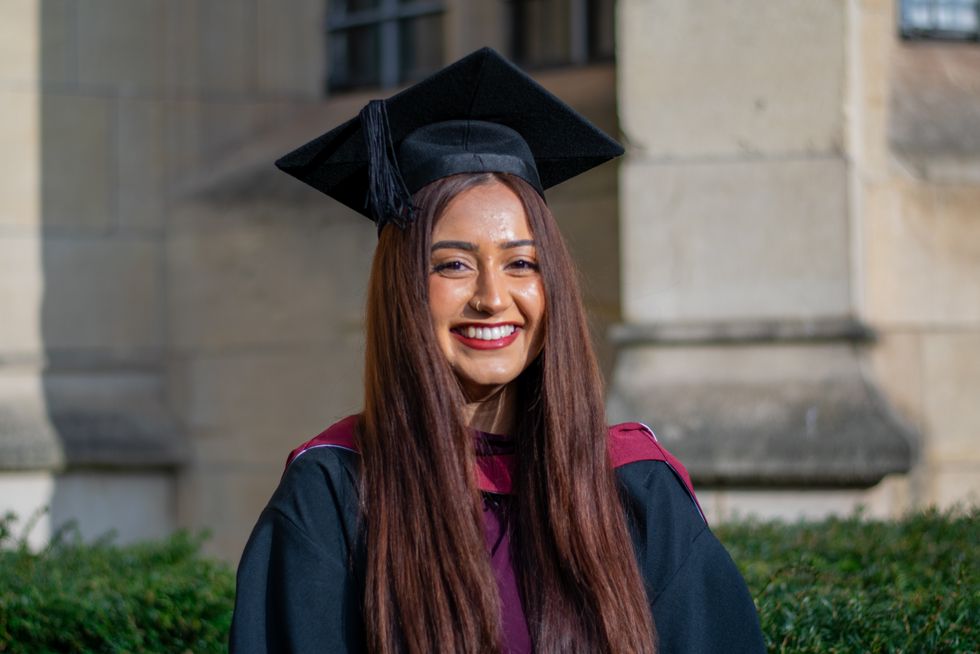 Inspiring graduate was first in her family to go to school after fleeing Taliban