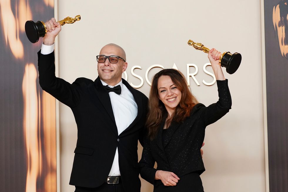 ‘A miracle’ – directors win Oscar for Iranian film hours after landing in LA