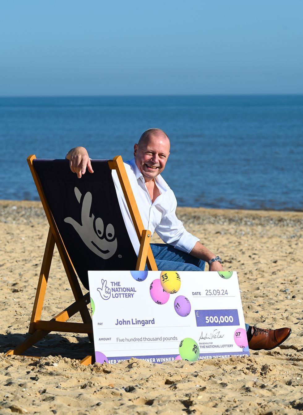 IT worker celebrates £500,000 lottery win just 12 months after cancer surgery