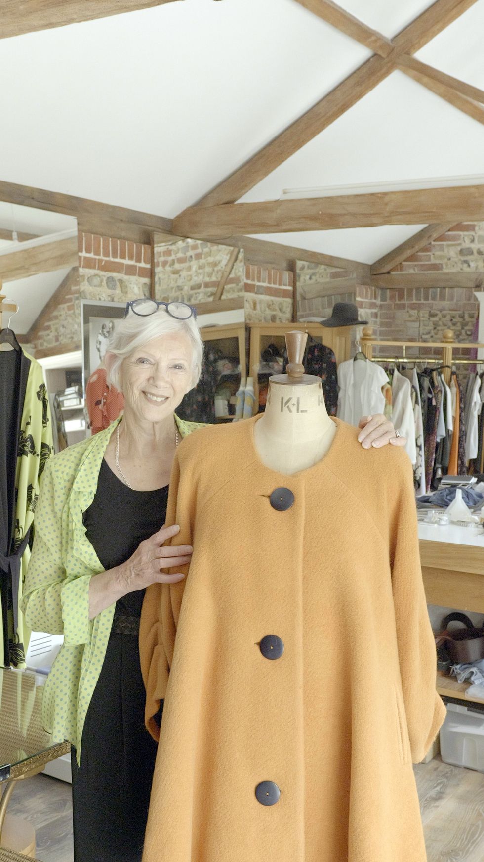 British designer ‘over the moon’ after long-lost coat found in charity shop