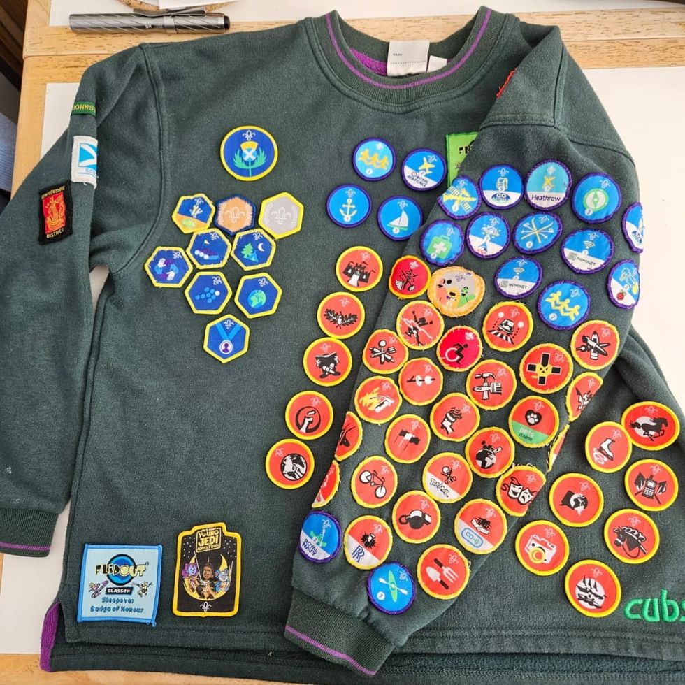 Boy, 10, celebrates achieving all 57 Cubs badges | indy100