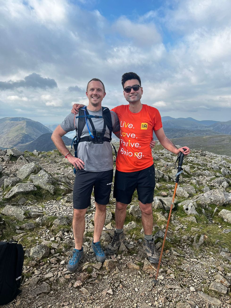 Blind lawyer and boss complete 24 peaks in 24 hours raising £140,000 for charity