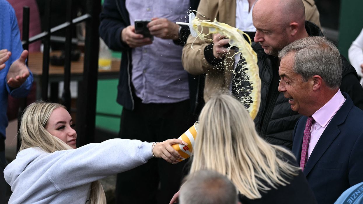 Nigel Farage has been hit by a milkshake again while campaigning in Clacton