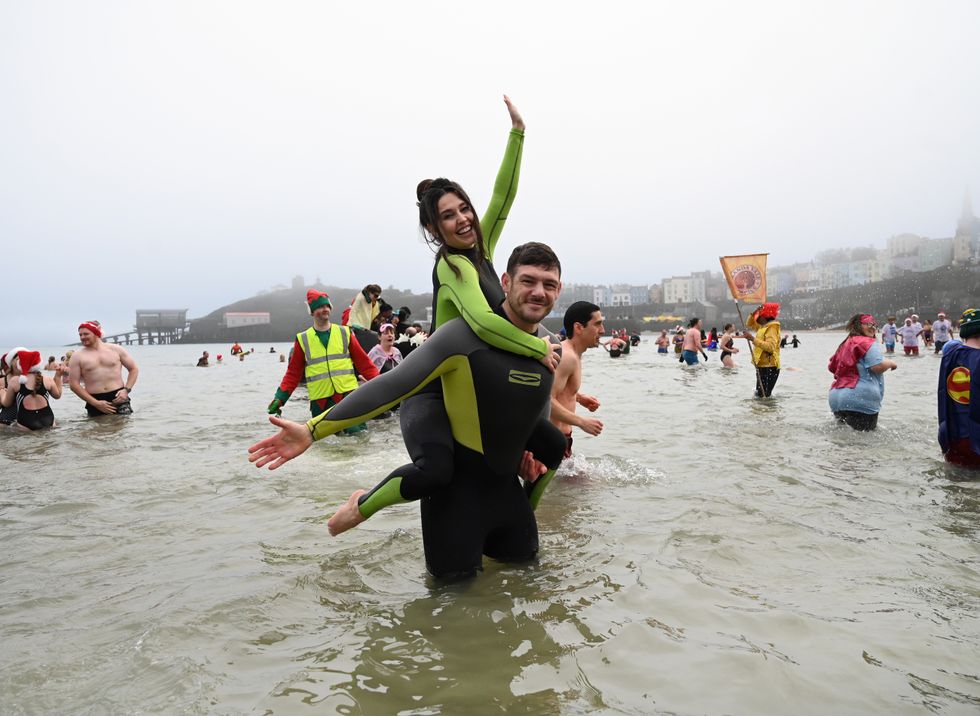 Romantic proposal makes waves at Tenby Boxing Day swim