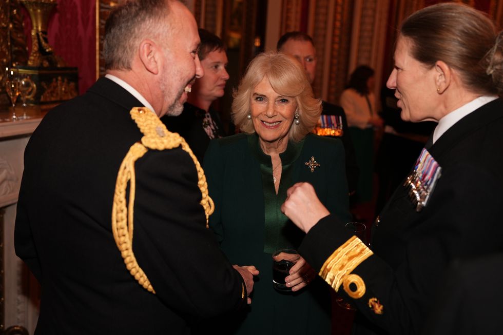 Submariners recall Queen delivering them tea and biscuits at palace reception