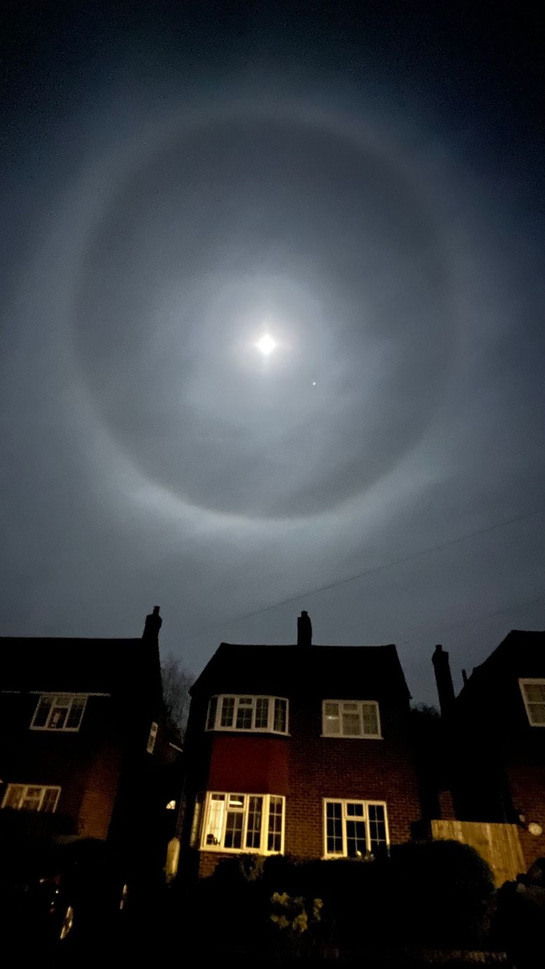 What causes a ring or halo around the Moon?