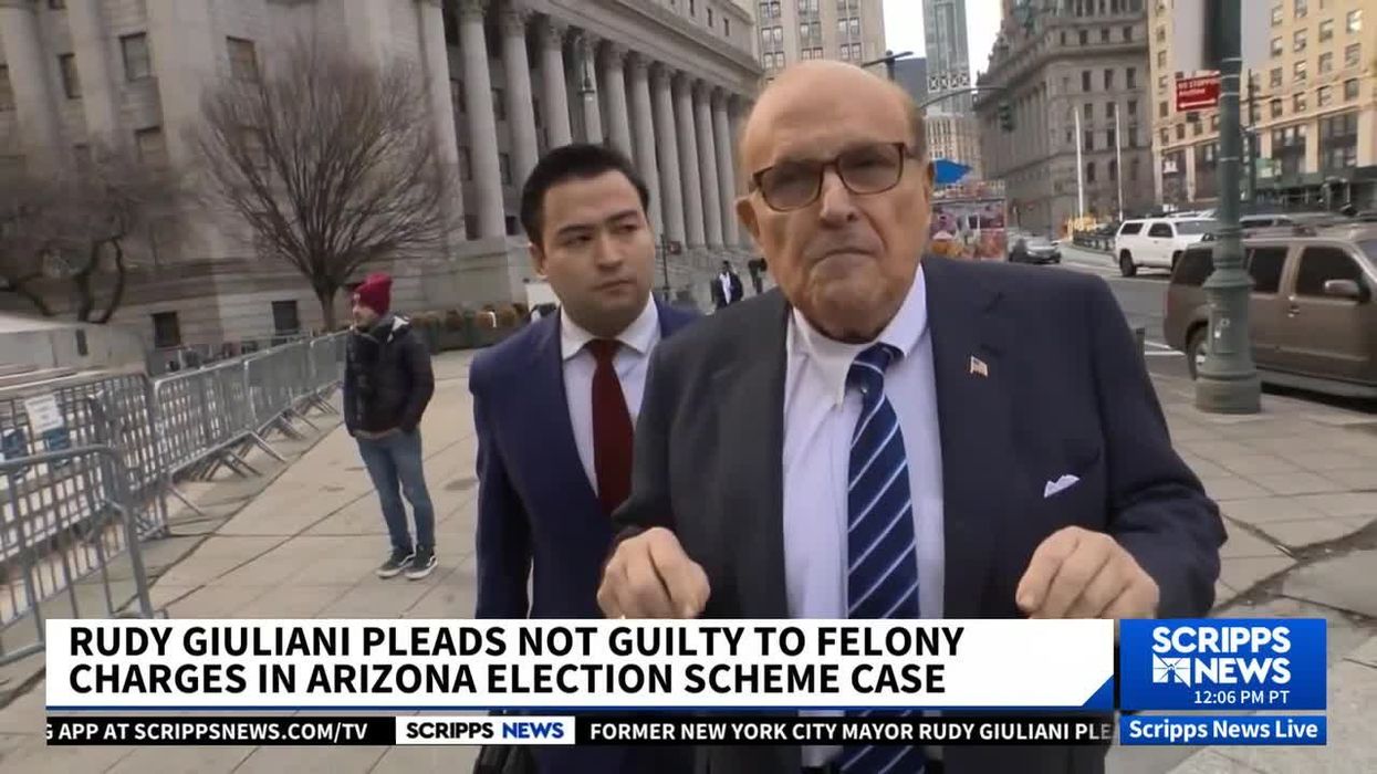 Rudy Giuliani appears to have been caught 'peeing' during his Trump arraignment call