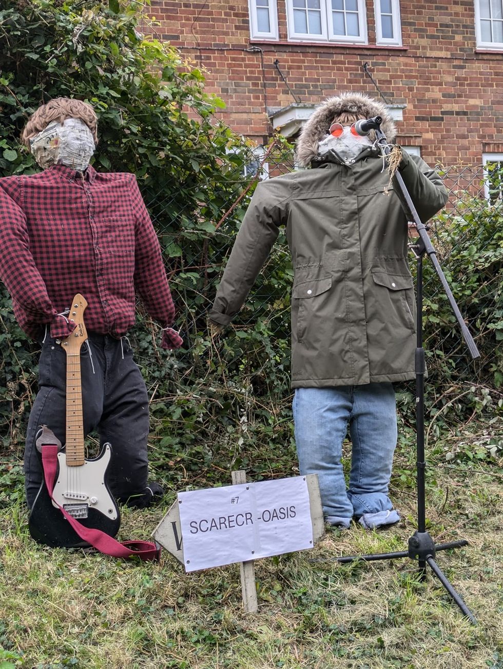 Oasis recreated in straw form as part of Cambridgeshire scarecrow festival