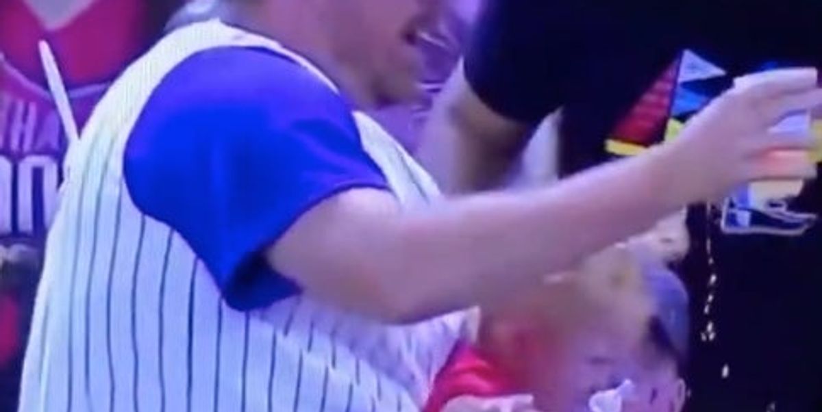 World's Coolest Dad Catches Foul Ball with Baby Strapped to His Chest and  Holding a Beer