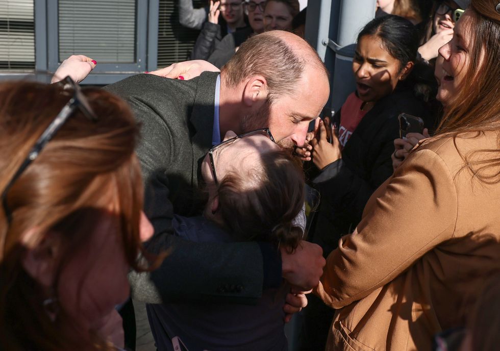 Prince of Wales gives ‘excited’ student a hug during visit to college