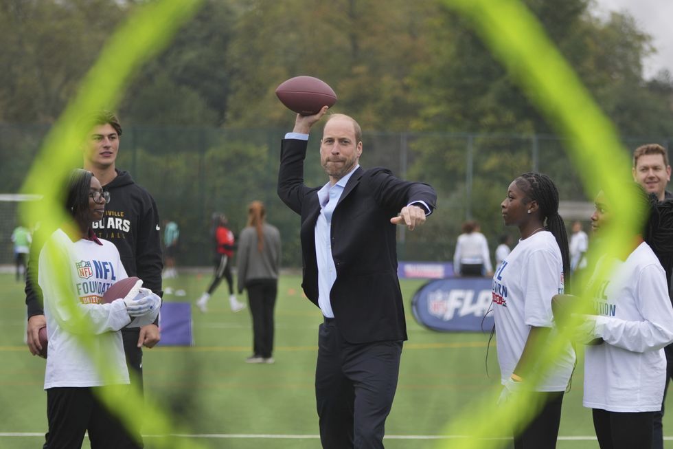 William shows off ‘unbelievable arm’ playing American football with youngsters