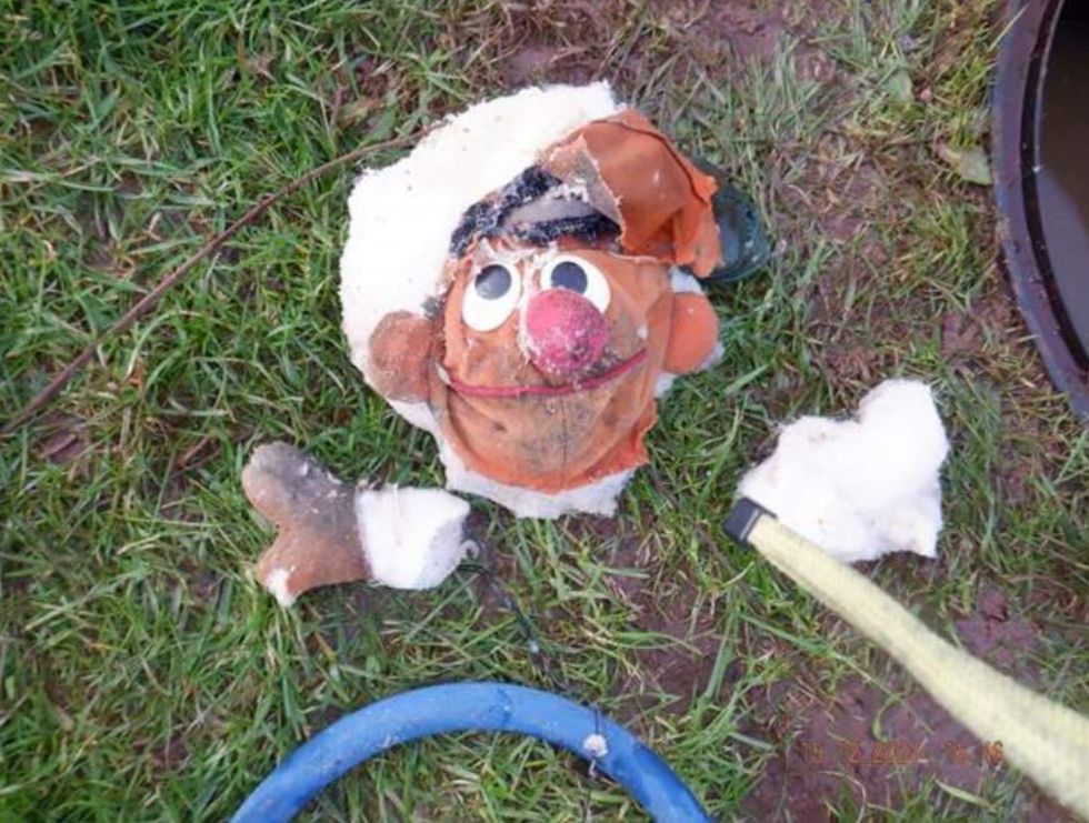 Nightmare on Sesame Street as Ernie teddy blocks sewer